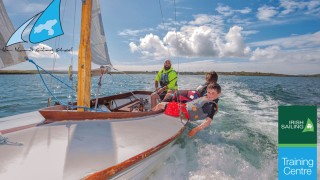 a group sailing in the sunshine in Roaring Water Bay