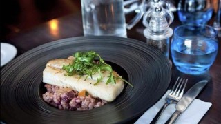 dinner dish with hake and risotto rice