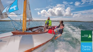 a group sailing in the sunshine in Roaring Water Bay